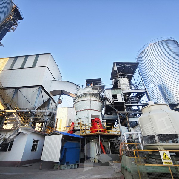 Roller mill for gypsum grinding in road construction